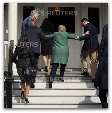 Hillary-being-helped-up-stairs-stroke