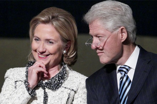 U.S. Secretary of State Hillary Rodham Clinton, and former President Bill Clinton, listen to speakers during a memorial service for Richard Holbrooke at the Kennedy Center, Friday, Jan. 14, 2011, in Washington.  Holbrooke, veteran US diplomat and Obama's special envoy to Afghanistan and Pakistan, died in December at the age of 69. (AP Photo/Carolyn Kaster)